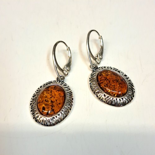 Click to view detail for  HWG-2437 Earrings, Ovals Rum Amber; Silver Open Weave $45